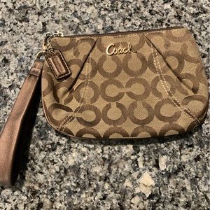 Small brown coach wristlet
